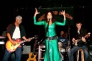 Daphne Rubin-Vega and the boys in the band Photo