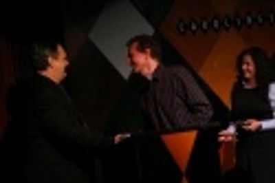 Bob Martin welcomes Jim Carnahan, the first Artios Award recipient of the evening, on Photo