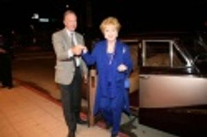 MGM star Debbie Reynolds arrives on red carpet in classic 1940 car Photo