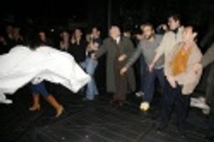 Nikki Renee Daniels, in front of Alexander Gemignani and other cast members Photo