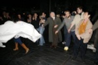 Nikki Renee Daniels, in front of Alexander Gemignani and other cast members Photo