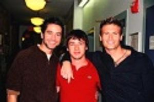 Scott Allgauer visiting with Adam Fleming and John Hill Photo