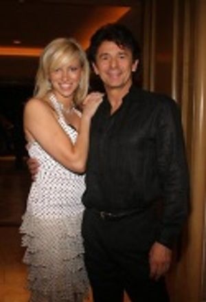 Deborah and Adrian pose seconds before Deborah rushes off to conclude another concert Photo