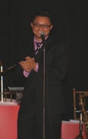 Connie and Carla's Alec Mapa amuses the crowd with a comic monologue all about growin Photo
