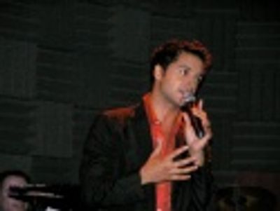 Jai Rodriguez (Queer Eye for the Straight Guy) kicks
off Act Two by helping director Photo