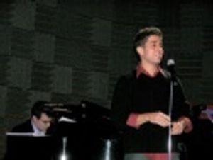 John Young (with Brian Lowdermilk on the piano) sings
"As If You Never Said Goodbye" Photo