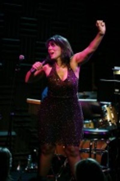 Christine Pedi performs "Roxie Santa" Photo