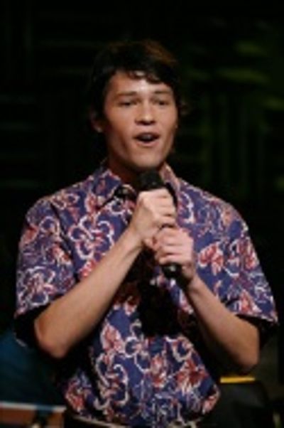 Jason Tam brought a touch of his native Hawaii to the crowd
with a Hawaiian Christma Photo