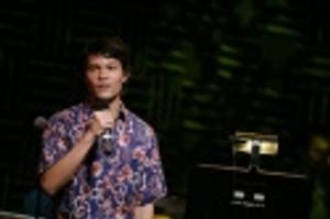 Jason Tam sings "Mele Kalikimaka" Photo