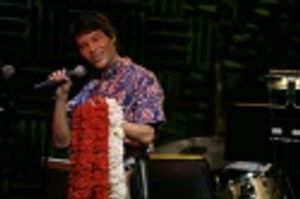 Jason with leis flown in for the night from Honolulu.
Audience leis compliments of J Photo