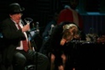 Performing a scene from the 1968 musical Promises, Promises!,
Michael Tucker and Jil Photo