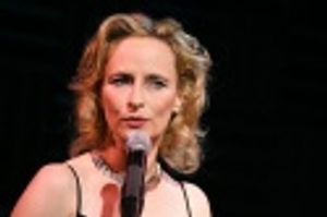 She then sang "She Thinks His Name Was John" Photo