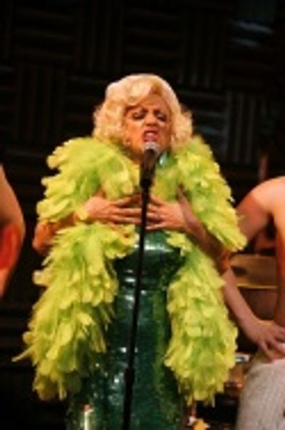 ...and lit up the stage for the holidays
in another Bob Mackie gown Photo