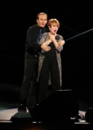 Jon Maher and Nancy Dussault sign and sing their way through the song, fascinating th Photo