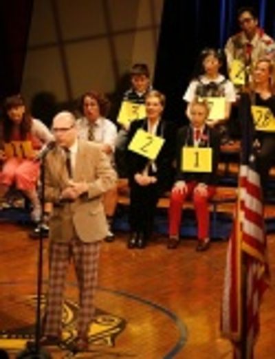 Greg Sturh with Spelling Bee stars and guest spellers, including Jessica-Snow Wilson, Photo