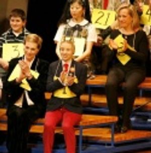 Cast and spellers, including (from bottom row) Julie Andrews, Sarah Saltzberg, Debora Photo