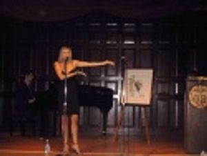 Jenn Colella works the crowd during her performance; background: Tom Kitt Photo