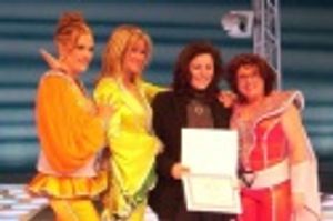 Vicki Van Tassel, Carol Linnea Johnson and Robin Baxter are presented with senatorial Photo