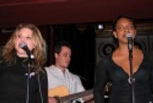 Lori Ann and Schele duetting on "Since I Fell for You" Photo