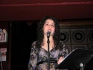 Julie Garnye singing Brian Lowdermilk's "No Apparent Reason" Photo