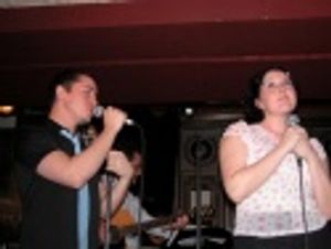 Adam and Natalie duetting on "A Whole New World" Photo