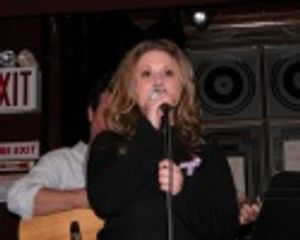 Lori Ann closing out the night with "Golden Thread" Photo