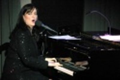 Ann at the piano
 Photo
