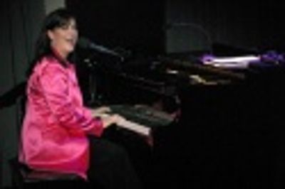 Singing an improvisational song for Fran Photo