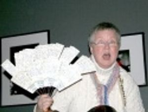 Folk singer Christine Lavin displays her MANY Chaperone tickets, so far she's attende Photo