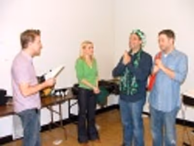 Greg Reuter rehearses the opening number with
Sarah Saltzberg, Steve Rosen and David Photo
