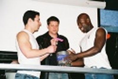 Roger Rosen, Christopher Sieber and Sean Baptiste reading off the raffle winners Photo