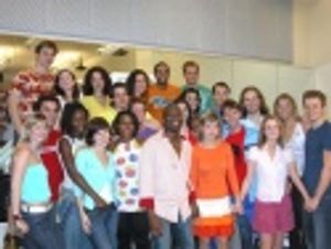 The entire cast posing for a group photo  Photo