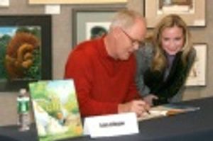 John Lithgow autographs copies of his new book Photo