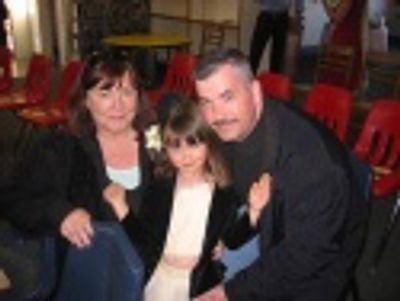 Liz Bertsch and husband Jerry Raustiala with daughter Bridie Photo