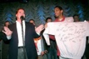 John Treacy Egan and Robert Fowler auction an autographed cast hoodie Photo