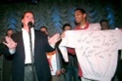 John Treacy Egan and Robert Fowler auction an autographed cast hoodie Photo