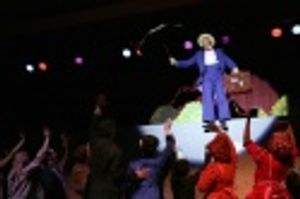 Mayor Michael Bloomberg flying over the stage Photo