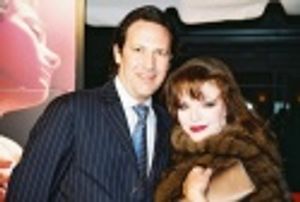 Joan Collins and husband Percy Gibson Photo