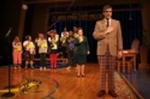 Mo Rocca and cast say the Pledge of Allegiance Photo