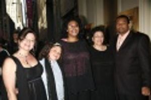 Constanza Romero and Azula Carmen Wilson with family and friends Photo