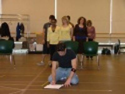 James Carpinello with (background) Kenita R. Miller, Curtis Holbrook, Anika Larsen, A Photo