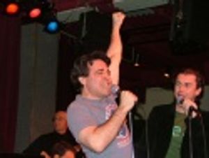 Mario sings as Bruce Springsteen in a number from High Fidelity Photo