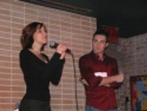 Andrea closed the show with her signature tune, "Tomorrow" as Scott looks on... Photo