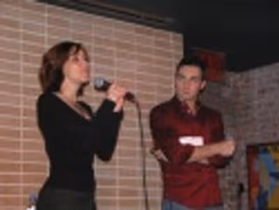 Andrea closed the show with her signature tune, "Tomorrow" as Scott looks on... Photo