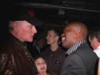 Mike Love talking to Titus Burgess  Photo