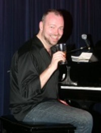 Ray Fellman on piano Photo