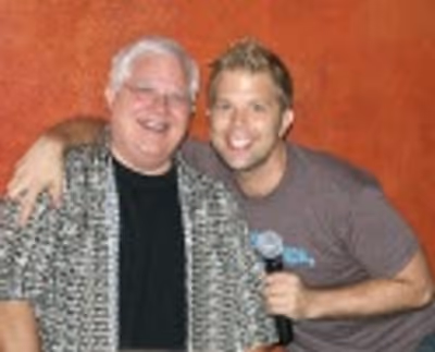 After Party Host Brandon Cutrell with his father the Reverend Cutrell, who came in fr Photo