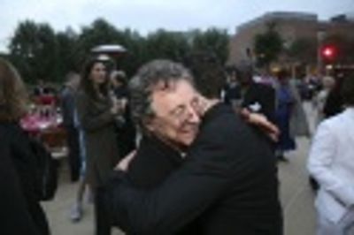 Frankie Valli hugs Christopher Kale Jones Photo