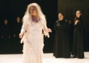 Mia Katigbak (foreground, in white), Carmen M. Herlihy and Sue Jean Kim (l-r, in blac Photo