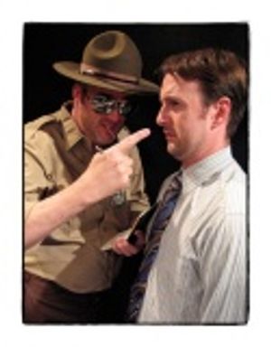 Darrell James as Officer McCurdy and Greg McFadden as Roy Photo